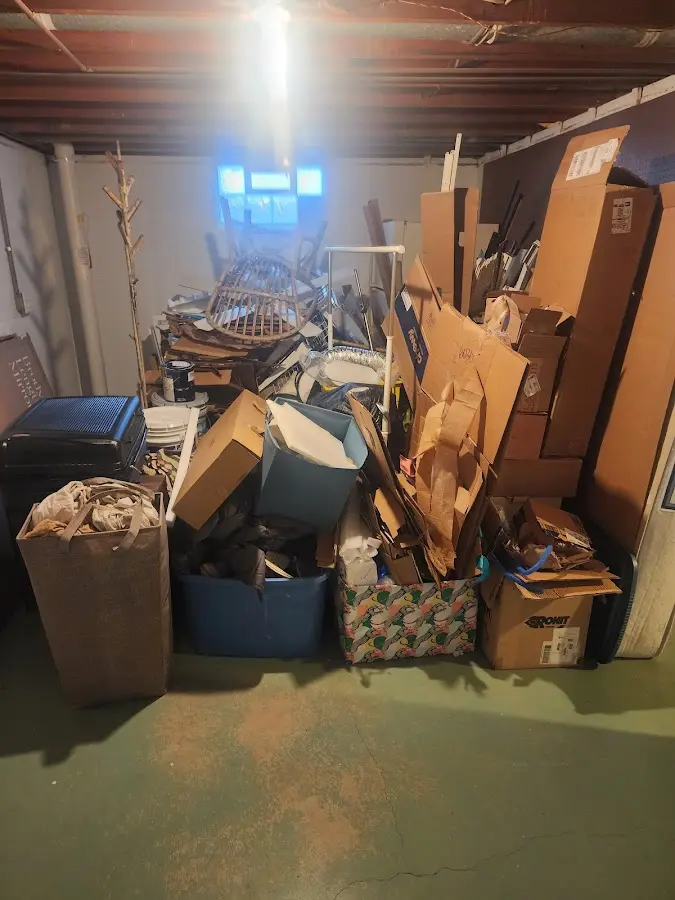 Roll-off dumpster container at job site for 2 Yard Dumpster Rental in Howland Center